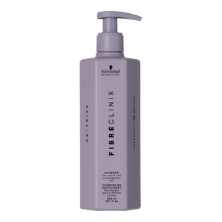 Schwarzkopf Fibreclinix shampoo in a light purple pump bottle on a white background