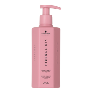 Fibre Clinix Vibrancy Conditioner in a light pink pump bottle on a white background