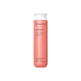 355ml peach coloured bottle of Living Proof Curl Conditioner for nourishing and defining curls.