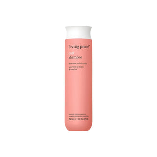 355ml peach coloured bottle of Living Proof Curl Shampoo for cleansing and defining curls.