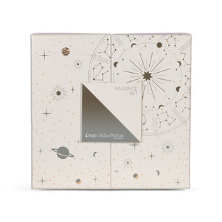 Light yellow/beige decorative box with silver celestial patterns on white background