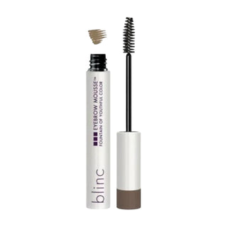 Blinc Eyebrow Mousse in Dark Blonde, packaged in a sleek silver tube with applicator wand.
